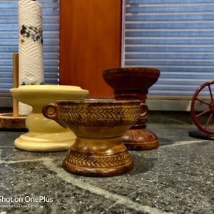 Three candle stick holders